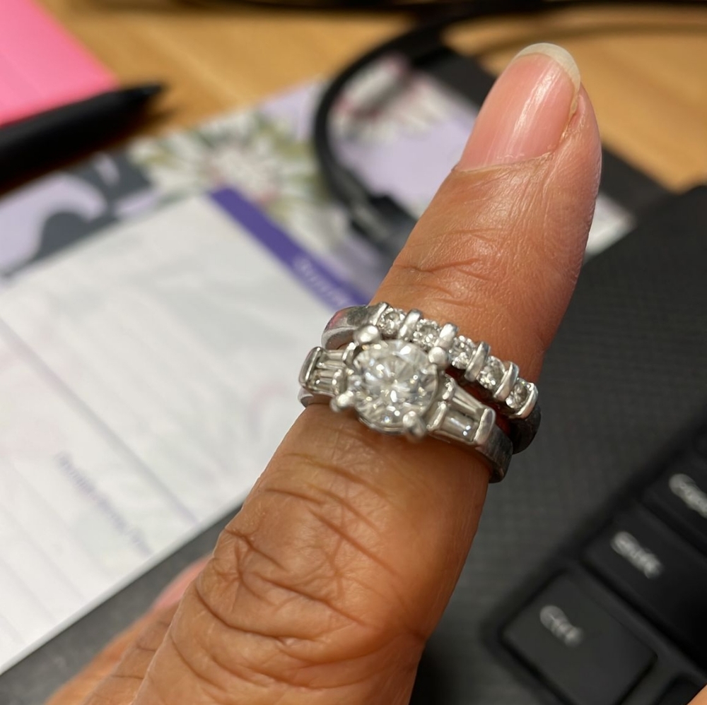 Platinum and diamond wedding ring set- 1 carat middle stone